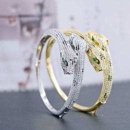 Designer bracelets for men and women High end luxuryChen double leopard head full diamond micro inlaid Zircon heavy industry high fixed versionstar same style