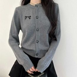 Knits Women's s Autumn Xiao Xiang Double C Bow Embroidered Round Neck Long sleeved Two tone Loose Knitted Shirt 894U