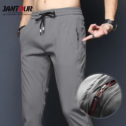 Mens Pants Spring Summer Casual Slim Fit Chinos Fashion Thin Zipper Pocket Elastic Waist Fast Dry Trousers Male Brand Clothing 231206