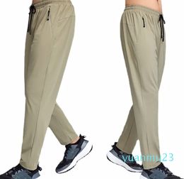 Jogger Long Pants Sport Yoga Outfit Cycling Drawstring Gym Pockets Sweatpants Trousers Men's Casual Elastic Waist Fitness