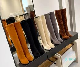 sexy, high-end, atmospheric, fashionable, and warm branded boots