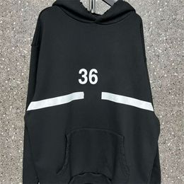 High version B family 360 fleece hoodie with custom woven and dyed fabric worn and washed with loose fitting men's and women's hoodies