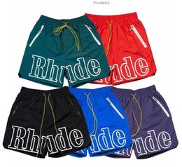 Rhude Men's Mesh Shorts Fashion Women's Casual Anti-smooth Board Hip Hop Beach Breathable Basketball Pants NKXC