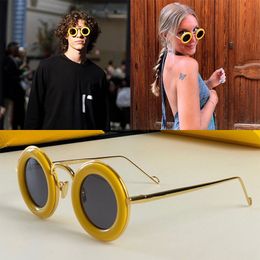 Curved metal frame sunglasses gold metal slim legs 40094U front acetate round frame casual and cute multi-color Lunettes de soleil temples with letter signature