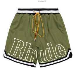 Designer Shorts Rhude Men's Capsule Summer Beach Pants Mesh Material Breathable Sweat Loose Fitness Basketball Mens Short IOGI