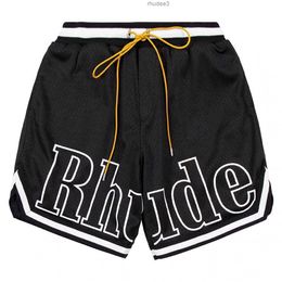 Designer Shorts Rhude Men's Capsule Summer Beach Pants Mesh Material Breathable Sweat Loose Fitness Basketball Mens Short Black K5PJ