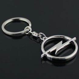 5pcs lot Fashion Metal 3D Car Logo Keychain Key Chain Keyring Key Ring Chaveiro Llavero For Opel Auto Pendant Car Accessories Whol234S