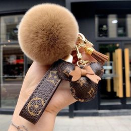 Designer keychain bear head leather fur ball pendant key chain bow car pendant metal fashion personality creative cute270O