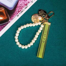 Designer Letter Keychain Pendant Keyring Fabric Pearls Chains Fashion Trendy Key Chain Mens Car Key Ring Womens Keychains Ornament164H