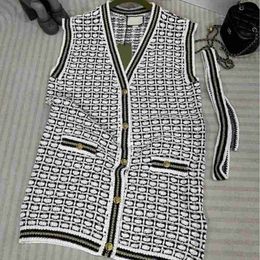 Women's Down & Parkas Designer Brand 23 New Knitted Vest Cardigan with Black and White Contrast Plaid Design, Waist Belt, Slim Upper Body, Advanced Fashion Women FEYE