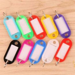 whole 100Pcs Mix Color Plastic Keychain Key Tags Id Label Name Tags With Split Ring For Baggage Key Chains Key Rings 210409266m