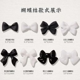 Nail Art Decorations 50pcsBag Black And White Nail Art Bowknot Resin 3D Nail Jewelry ThreeDimensional Ribbon Polishing Jewelry DIY Nail Art Design 231207