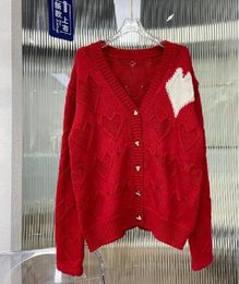 2024 Autumn/Winter New Girls' Style Red Hollow Heart Metal Button V-neck Long Sleeve Knitted Loose Cardigan Women's Sweater