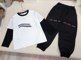 Brand kids designer clothes baby Tracksuits Size 120-160 Fake short sleeved pullover design Hoodies and sweat pants Dec05