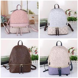 Leather Handbags High Quality Backpack men and women School Backpack famous Rivet printing Backpack Designer lady Bags Boy and Gir326I