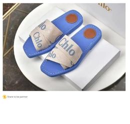 2023 Newest Branded Women Woody Mules Flat Slipper Designer Lady Lettering Fabric Outdoor Leather Sole Slide Sandal a3