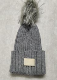 New Pom Winter New Warm Woollen Hat Designer Knitted Women Hats Selling Fashionable Beanies 7737662