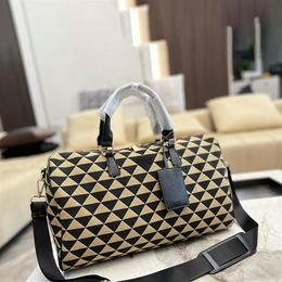 Man Women 45cm Embroidered Travel Bag Black Beige Fabric Duffel Bags Leather Handles Luggage Designers Tote with Shoulder Strap262s