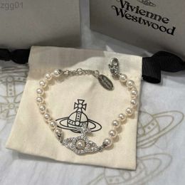 Designer Viviene Westwood New Viviennewestwood 23 Western Empress Dowager Hollow Saturn Pearl Armband Womens French Classic Planet Cross Pearl Armband 59565