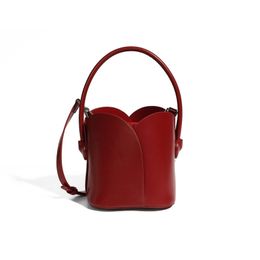 2023 Autumn/Winter Petal bag New Cowhide Genuine Leather Crossbody Women's Bag Small and High end Small Handheld Drawstring Bucket Bag red