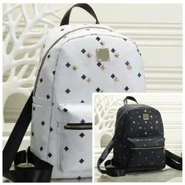 Leather Handbags High Quality 2 size men and women School Backpack famous Rivet printing Backpack Designer lady Bags Boy and Girl 280t