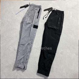 Men's high quality stone cotton nylon pants designer style ladies the same couple fashion personality 99048 solid Colour 2023