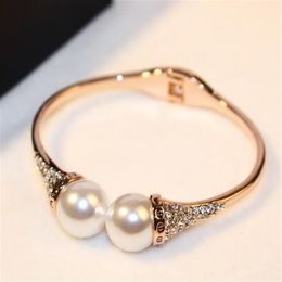 European exaggerated fashion inlaid zircon pearl female bracelet plated 18k gold simple luxury bracelet party casual wild bracelet253N