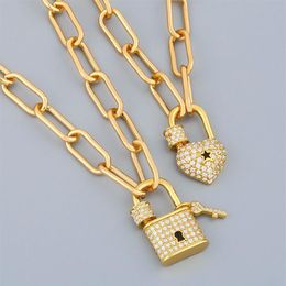 FLOLA Gold Long Chain Key Padlock Necklace For Women Crystal Heart Lock Pendant Cubic Zirconia Punk Jewelry Couple Gifts nker60292f