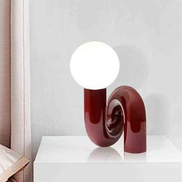 Nuova resina rosso blu lampada da tavolo a led sfera di vetro camera da letto comodino scrivania luce camera dei bambini designer modello camera arredamento per la casa H220423277c