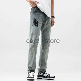 Men's Pants Ripped Men's Jeans Leather Patched Trousers Mid Waist Letter Embroidered Male's Causal Pants Zipper Spliced Denim Clothing J231208