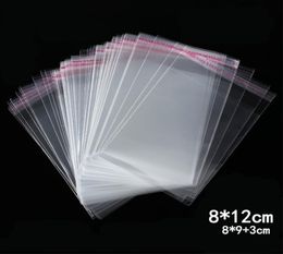 1000pcs 812cm Clear Self Adhesive Plastic Bag Resealable Christmas Gift Cookie Candy Packaging Bag Home Wedding Decoration5090962