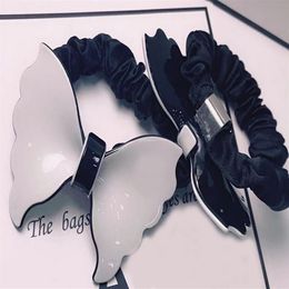 7X5CM Black and white acrylic bow rubber bands C head rope hair ring hairpins for ladies Favourite headdress Jewellery Accessories vi315K