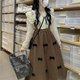 Work Dresses Autumn Doll Collar Blouse And Brown Bow High Waist Suspenders Skirt Suit For Women Regular Fit Ladies Two Piece Set Outfits