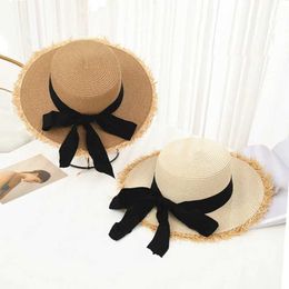 Wide Brim Hats Bucket Hats Tassel womens lace bow str hat summer womens casual soft padded sun hat ribbon sun skirt c beach J240425