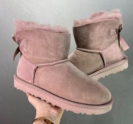 Designer Classic Single Ribbon Bow Low Barrel Snow Boot Rubber Sole Anti slides and Warm Flat Bottom Ladies Booties