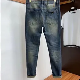 2023 Дизайнерские мужские узкие джинсы Модные маленькие эластичные брюки для ног Повседневные брюки Весна и осень Новый продукт Джинсы Мужские длинные брюки Модные мужские молодежные брюки