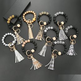 Keychains & Lanyards Black Frosted Wooden Bead Bracelet Keychain Fashion Pattern Tassel Pendant Bracelets Women Girl Key Ring Drop Del Dh0Rn