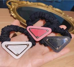 European and American Triangle Letter Hair Rubber Bands Iron Piece Ponytail Accessories Female High Quality Fast Delivery1518285