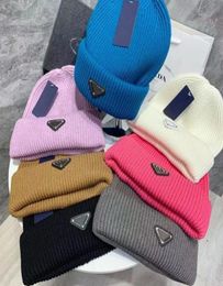 Winter plain wool beanie hat warm knit beanie hat Triangle logo short fisherman beanie hat for men and women2667297