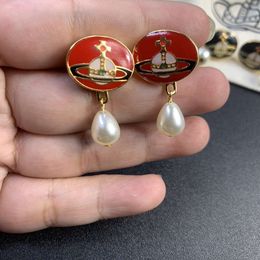 Designer Viviene Westwood New Viviennewestwood Nanas Same Western Empress Dowager Saturn Enamel Earrings Female Earth Planet Water Drops Pearl Earrings Detacha