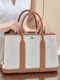 Luxury Designer tote Bags Hremmss Party Garden online store Handmade wax thread canvas garden bag hand held bucket 2023 new crossbody leather for Have Real Logo