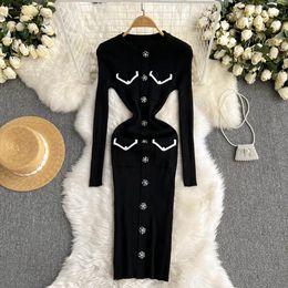 Women's elegant unique long sleeved sexy tight fitting dress retro Korean fashion knitted tight vest autumn and winter sweater 231213