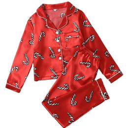 Rompers Christmas Family Clothes Set ParentChild Autumn Solid Stripe Satin Imitation Silk Pyjamas Matching Mother Kids Outfits 2023 231212