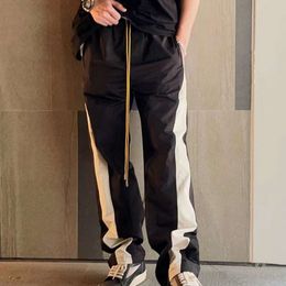 Rhude Pants Designer Fashion Men Small And Trendy Colour Contrast Patchwork High Street Casual Drawstring Sports Straight Pants