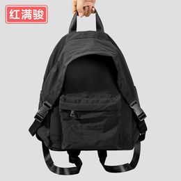 Fashionable and lightweight nylon backpack for women, simple and versatile for outdoor travel, Japanese and Korean new student solid Colour backpack