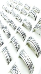 Whole 100pcsLot Fashion Stainless Steel Spin Band Rings Black Etched Mixed Patterns Jewelry Mens Womens Rotatable Party Ring 7279451