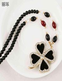 Korean Fashion Lucky Fourleaf Clover Pendant Long Necklace Female Inlaid Crystal Zircon with Beaded Jewelry8050019
