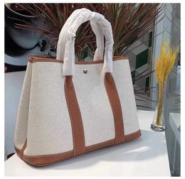 Factory Outlet Wholesale Hremmss Party Garden Tote bags for sale 2023 New Top Cowhide Bag Portable Canvas Commuter Large Capacity Shoulder Have Real Logo