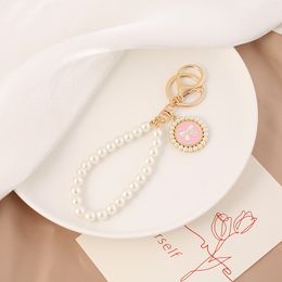 Creative pearl bow key chain men women exquisite lovely bag pendant beautiful party gift pink car key chain