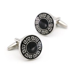 Classic round enamel cufflinks with black carved lacquer brand design